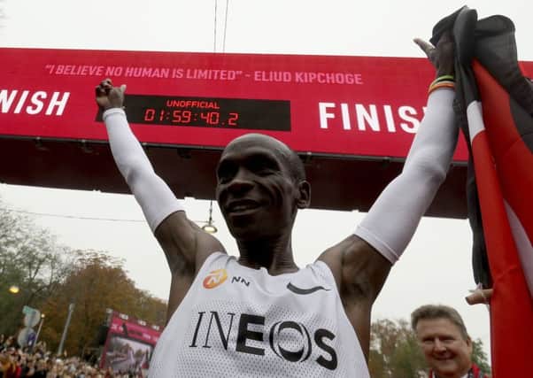 Marathon runner Eliud Kipchoge from Kenya celebrates his historic feat. Pic: AP Photo/Ronald Zak