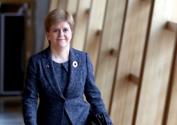 First Minister Nicola Sturgeon arrives ahead of First Minister's Questions at the Scottish Parliament in Edinburgh. Picture: Jane Barlow/PA Wire