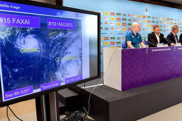 RWC tournament director Alan Gilpin, centre, on Typhoon Hagibis, cancelling games and refusing to be flexible. Photograph: William WestAFP/Getty Images