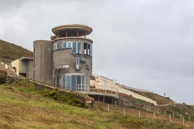 Edward Short, 50, who owns Chesil Cliff House said he will finish the project - but will have to sell it to cover the large amount of money he borrowed to build it.