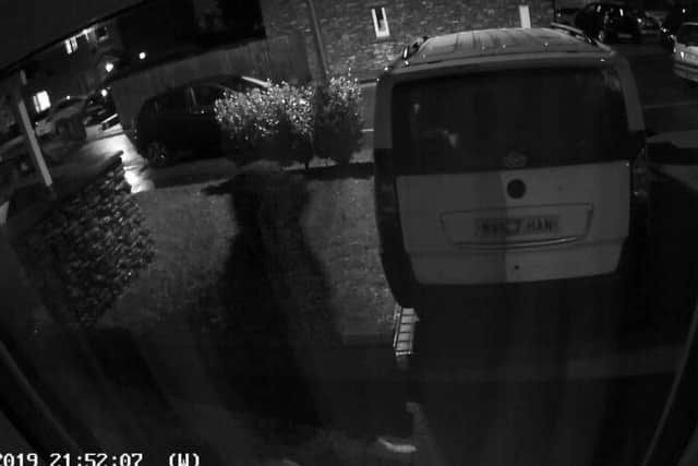 The CCTV camera installed in their living room window and pointing to the drive outside - recorded explicit audio of what sounds like two people having sex.