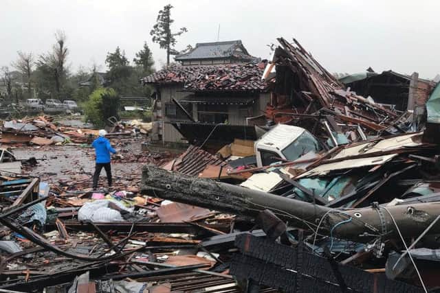 Damaged houses caused by Typhoon Hagibis in Ichihara in the Chiba prefecture. Picture: Jiji Press/AFP via Getty Images