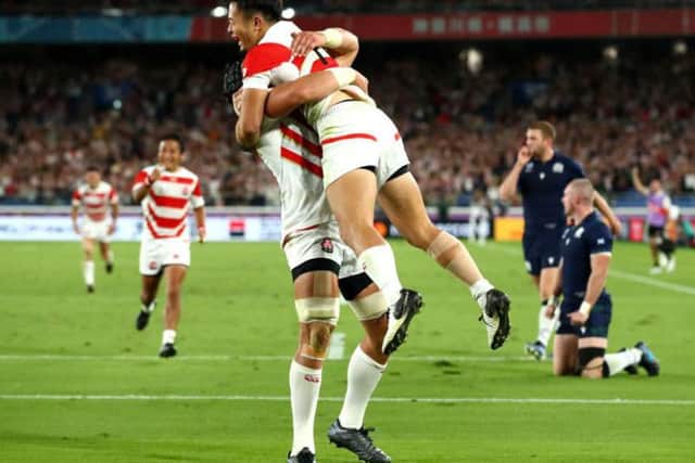 Japan wing Kenki Fukuoka celebrates the first of his two tries, and his side's third, during the 28-21 over Scotland in Yokohama. Picture: Getty Images