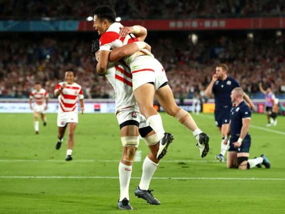Japan wing Kenki Fukuoka celebrates the first of his two tries, and his side's third, during the 28-21 over Scotland in Yokohama. Picture: Getty Images