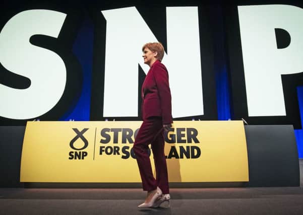 Nicola Sturgeon on stage before the start of the SNP annual conference at the Event Complex in Aberdeen. Picture: PA