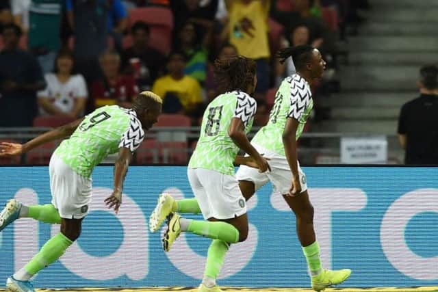 Joe Aribo wheels away to celebrate his goal against Brazil