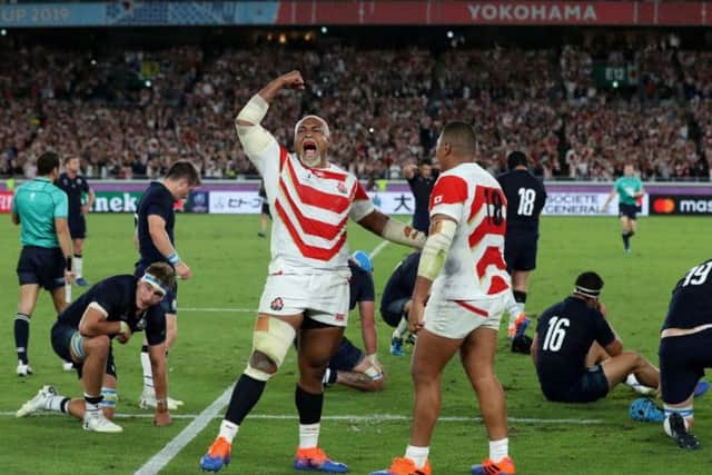 Japan's Isileli Nakajima celebrates victory during the 2019 Rugby World Cup match at the Yokohama Stadium