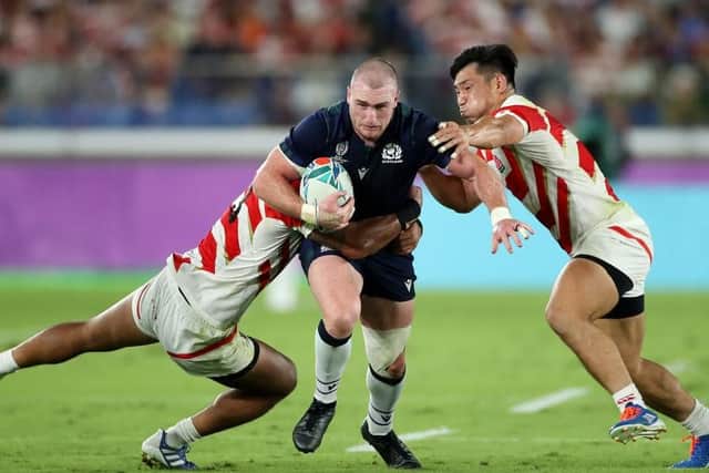 Stuart Hogg is stopped in his tracks by the Japan defence. Picture: Getty Images