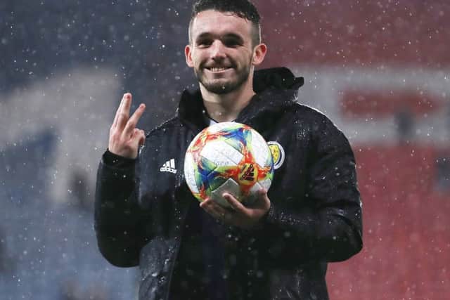 John McGinn poses with the match ball following his first-half hat-trick in Scotland's 6-0 rout of San Marino. Picture: Ian MacNicol/Getty Images