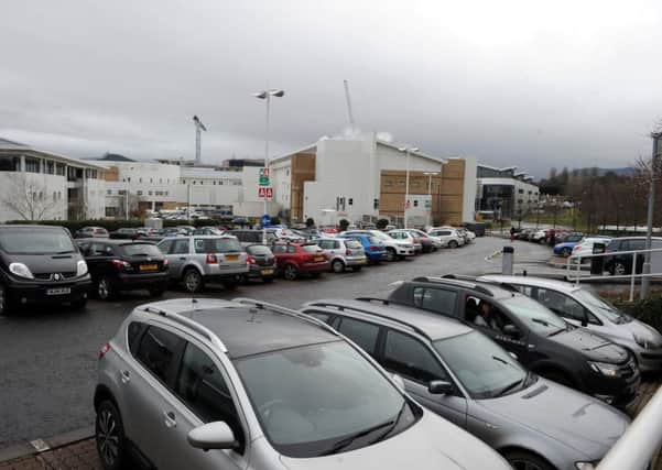 NHS staff like those parking at Edinburgh Royal Infirmary will be exempt from the new levy (Picture: Lisa Ferguson)