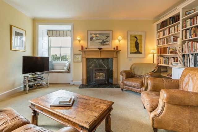 The cosy family room is one of three reception rooms.