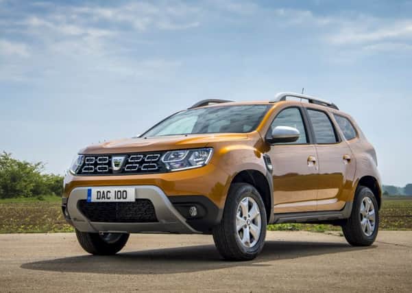 The Dacia's elevated chassis and large boot are key assets