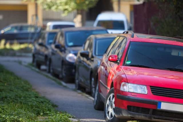 Pavement parking can block off sidewalks and make life difficult for people who are less mobile. (Picture: Shutterstock).