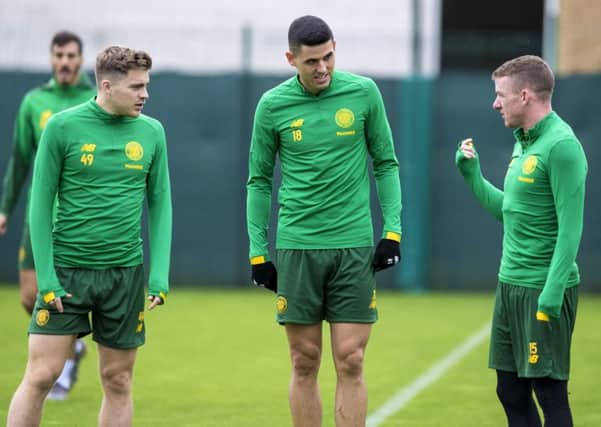 James Forrest, left, with Tom Rogic and Jonny Hayes. Picture: SNS
