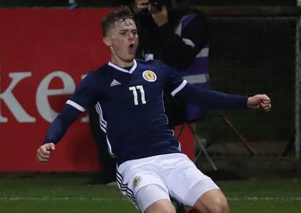 Josh McPake celebrates his winning goal for Scotland U19s.
