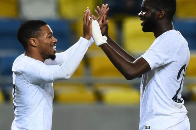Odsonne Edouard, right, celebrates with Arnaud Nordin during France U21s' win in Slovakia. Picture: AFP via Getty Images