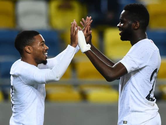 Odsonne Edouard, right, celebrates with Arnaud Nordin during France U21s' win in Slovakia. Picture: AFP via Getty Images