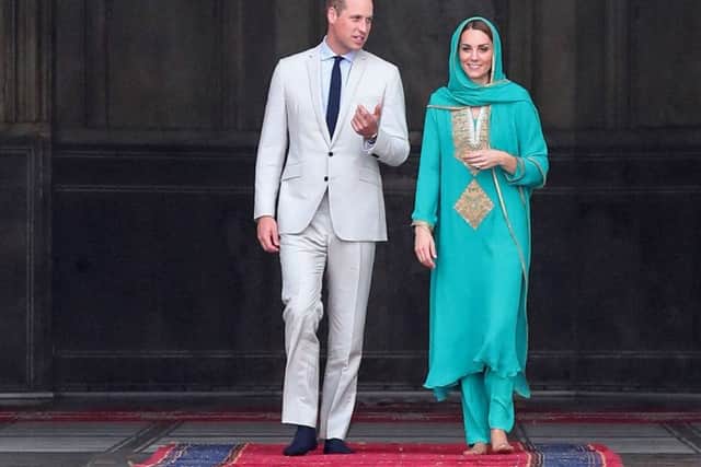 Prince William, Duke of Cambridge and Catherine, Duchess of Cambridge visit the Badshahi Mosque within the Walled City during day four of their royal tour of Pakistan.  (Photo by Chris Jackson/Getty Images)