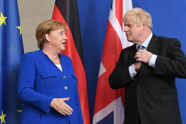 Boris Johnson with German Chancellor Angela Merkel in Berlin, ahead of talks to try to break the Brexit deadlock. Picture: PA