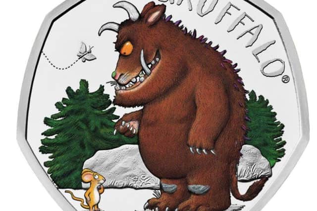 The Royal Mint of The Gruffalo, who is being celebrated on a new commemorative 50p coin, depicting the beast's first meeting with Mouse in the woods. Picture: PA
