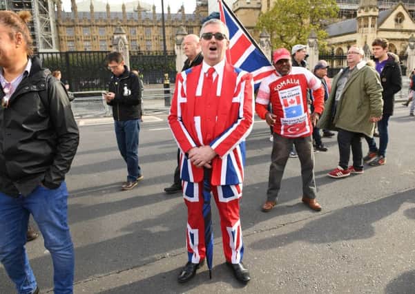 A Pro-Brexit protester wears a Union Jack suit to show where his allegiances lie (Picture: Stefan Rousseau/PA Wire)
