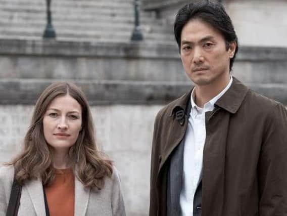 Kelly MacDonald and Takehiro Hira team up to solve a murder. Picture: BBC/Netflix