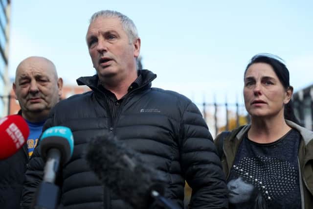 IRA murder victim Jean McConville's children Michael (centre), Susie (right) and Archie, outside Belfast Crown Court following the trial of the facts into two charges of soliciting the murder of Jean McConville against veteran republican Ivor Bell. PRESS ASSOCIATION Photo. Brian Lawless/PA Wire