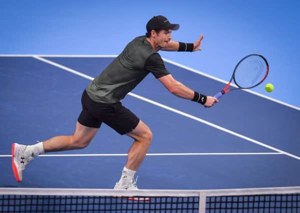 Andy Murray plays a backhand volley during his straight-sets win over Uruguays Pablo Cuevas at the European Open in Antwerp. Picture: Luc Claessen/BELGA/AFP