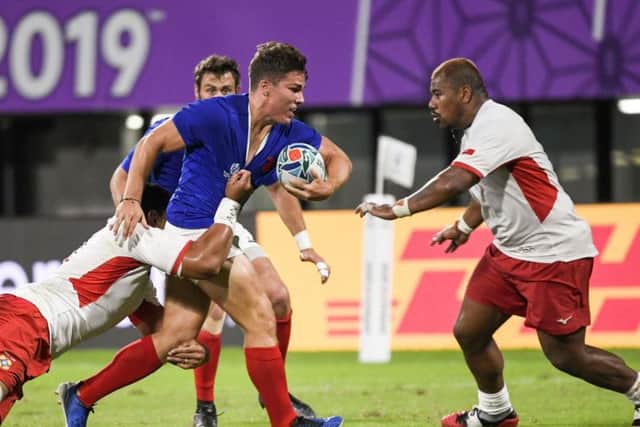 Antoine Dupont in action for France against Tonga