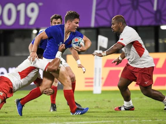 Antoine Dupont in action for France against Tonga