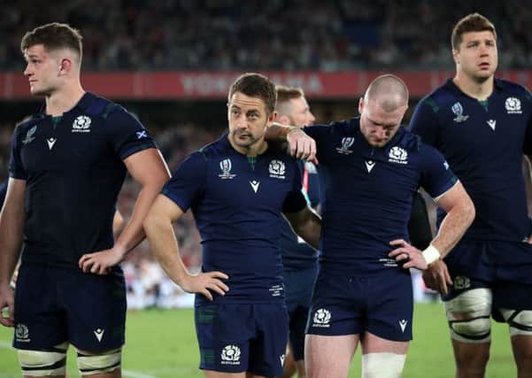Dejection at the final whistle following defeat by Japan. But the numbers just dont stack up for Scotland. Picture: PA.