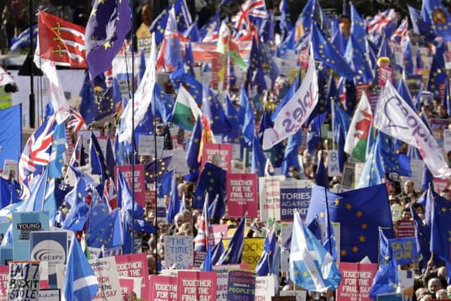 Anti-Brexit protestors march in London.(AP Photo/Matt Dunham)