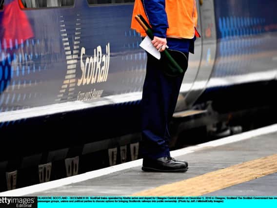 The busy line was closed down temporarily after a person was struck by a train between Greenock and Gourock. Picture: PA