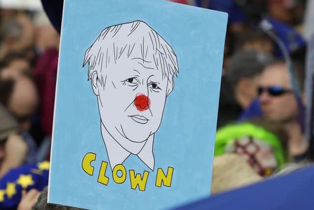 A placard depicting Boris Johnson at yesterday's demonstration for a People's Vote in London. Picture: 
Kirsty Wigglesworth/AP