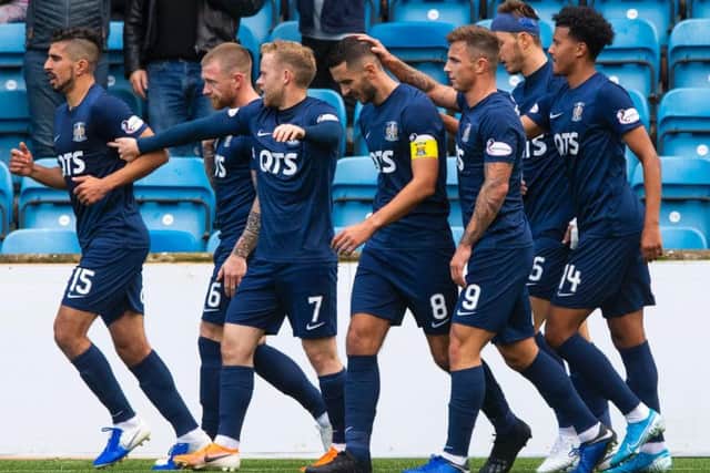 Kilmarnock's players celebrate Rory McKenzie's goal against Livingston