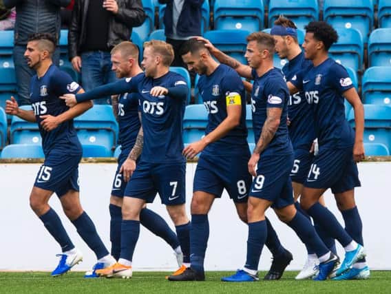 Kilmarnock's players celebrate Rory McKenzie's goal against Livingston