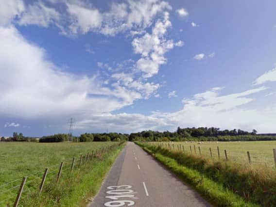 The man wass found beside an orange KTM scrambler bike on the B9103 Sheriffston to Lossiemouth road. Picture: Google