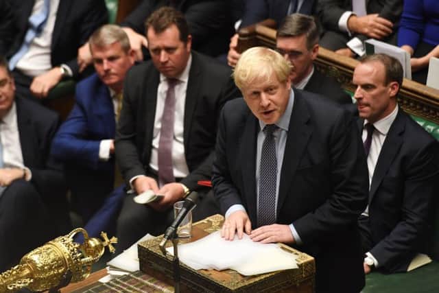 Prime Minister Boris Johnson (R) speaking in the House of Commons. Picture: Getty Images