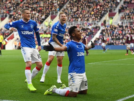 Alfredo Morelos celebrates his equaliser in front of the Hearts fans