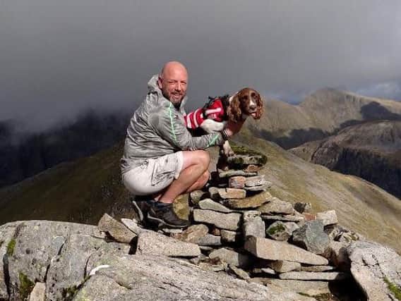 Mr Wright, who spent 25 years in the army, adopted Genghis in 2016. Picture: Saltire News and Sport