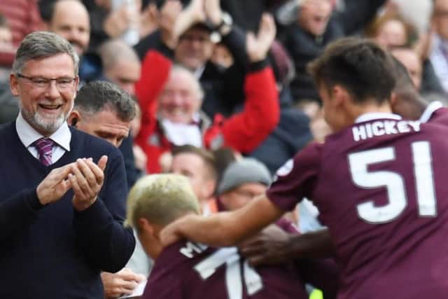 Craig Levein celebrates Ryotaro Meshino's goal