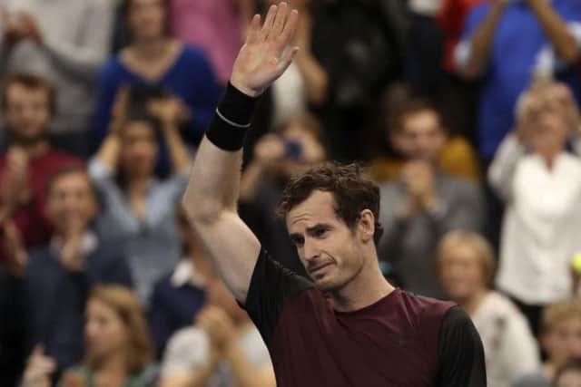 A tearful Andy Murray salutes the crowd after winning the European Open final