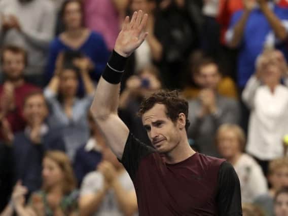 A tearful Andy Murray salutes the crowd after winning the European Open final