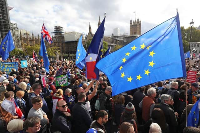 Anti-Brexit protesters fill Parliament Square in London, after Boris Johnson delivered a statement in the House of Commons, on his new Brexit deal (Picture: Andrew Matthews/PA Wire)