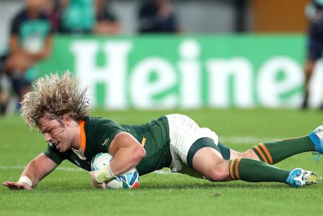 Scrum-half Faf De Klerk scores for South Africa in the 26-3 victory over Japan.