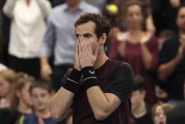 Andy Murray seems scarcely able to believe that he has beaten Stan Wawrinka to lift the European Open trophy. Picture: Francisco Seco/AP
