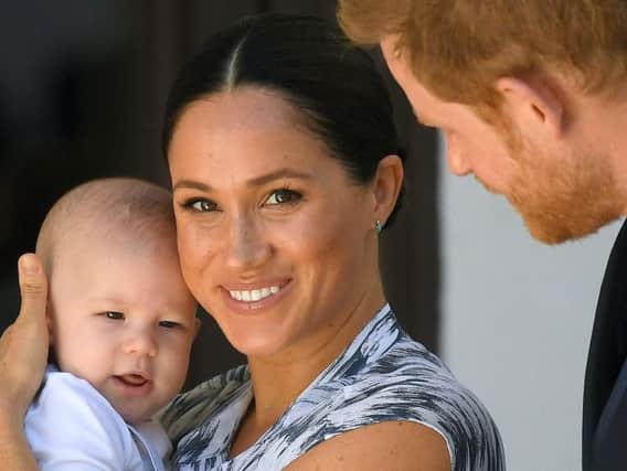 Meghan and Harry with their son Archie during the royal visit to South Africa.
