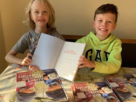 Brothers Ollie (right), 10, and Harry Ferguson (left), seven, are working their way through a bucket list of 500 adventures.