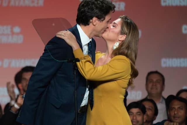 Canadian Prime Minister Justin Trudeau kisses his wife Sophie Grgoire Trudeau. Picture: AFP