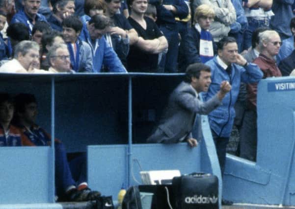 Tommy McLean in the Ibrox dugout.